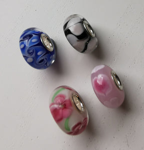Glass charm beads